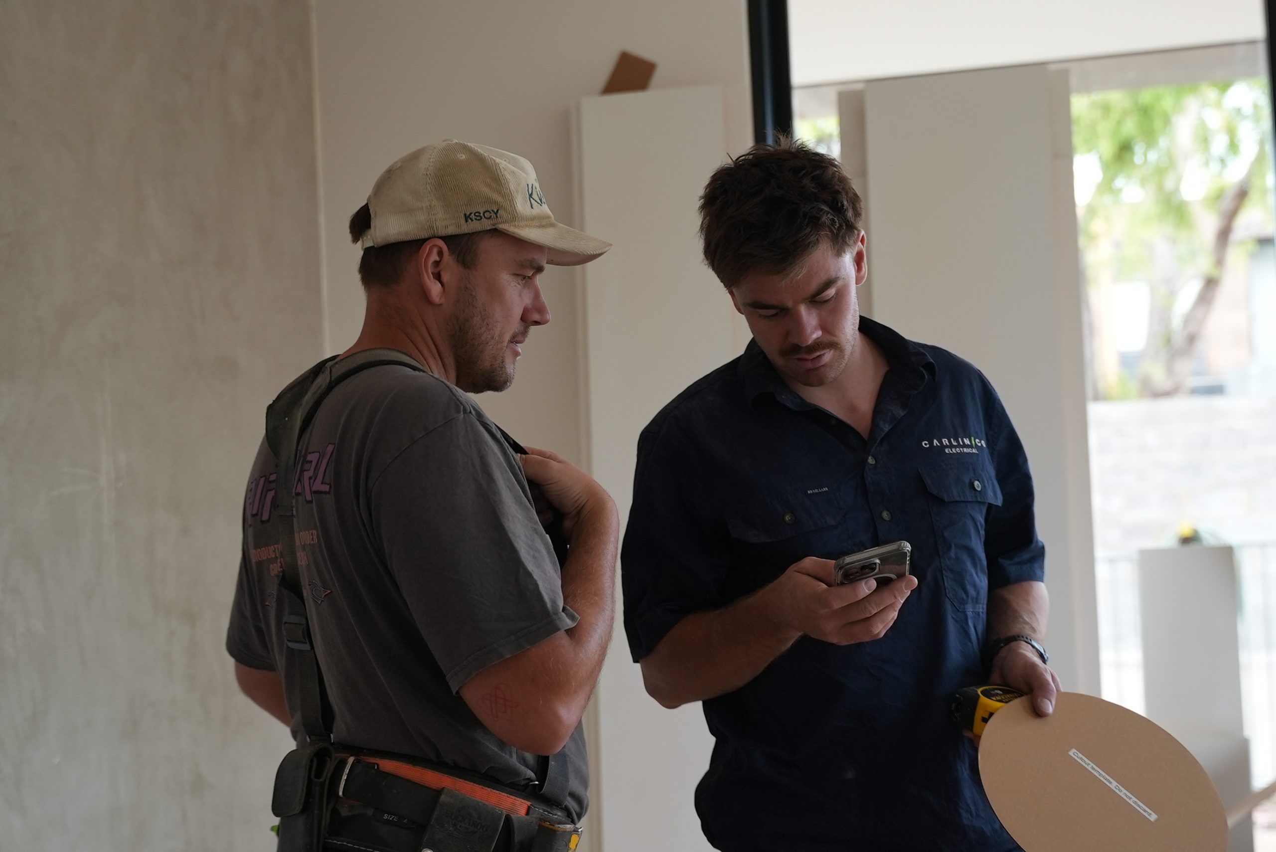 Carlin Co electricians coordinating on a job site in Melbourne