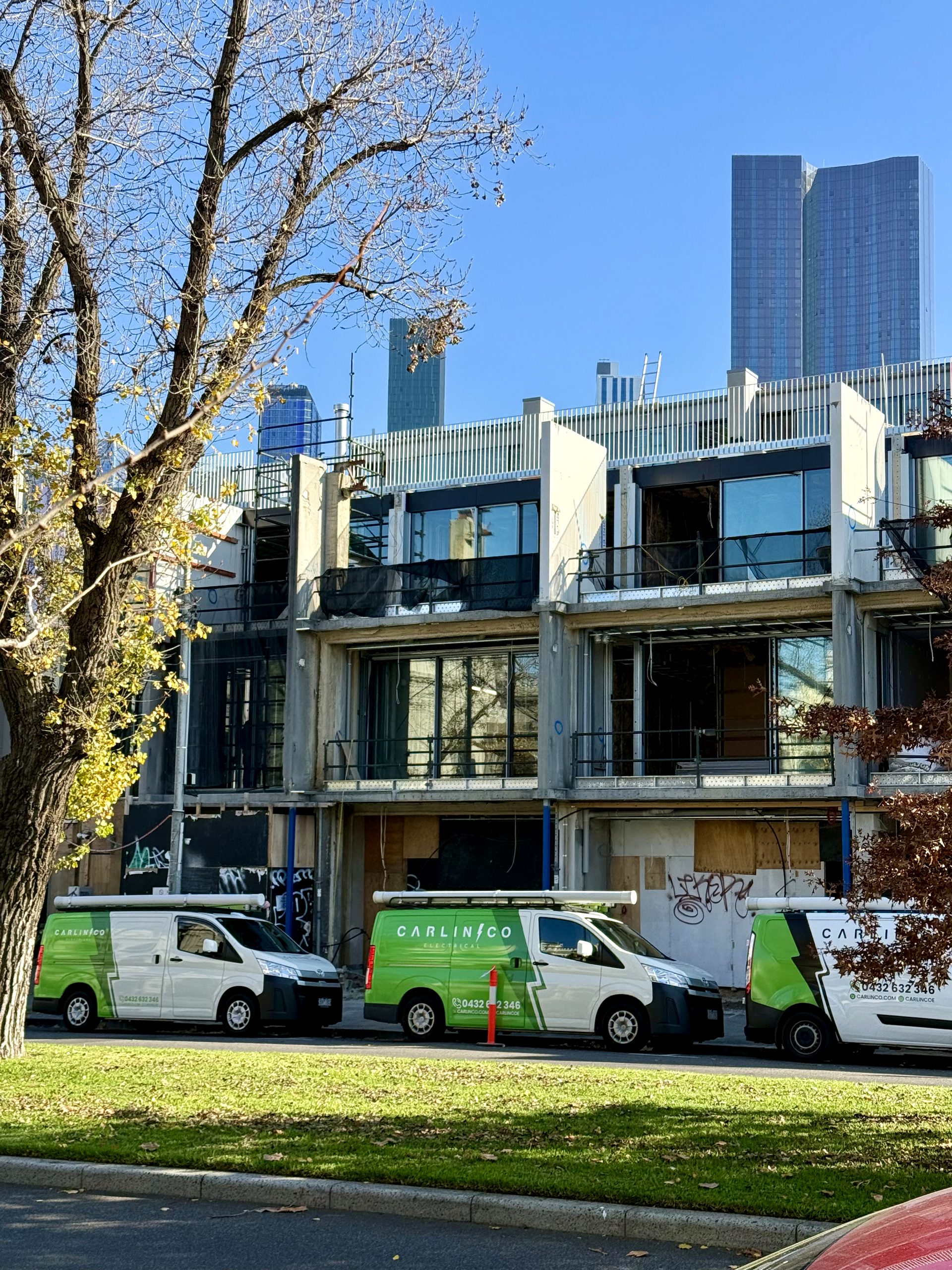 Carlin Co Electrical fleet at commercial building site in Melbourne