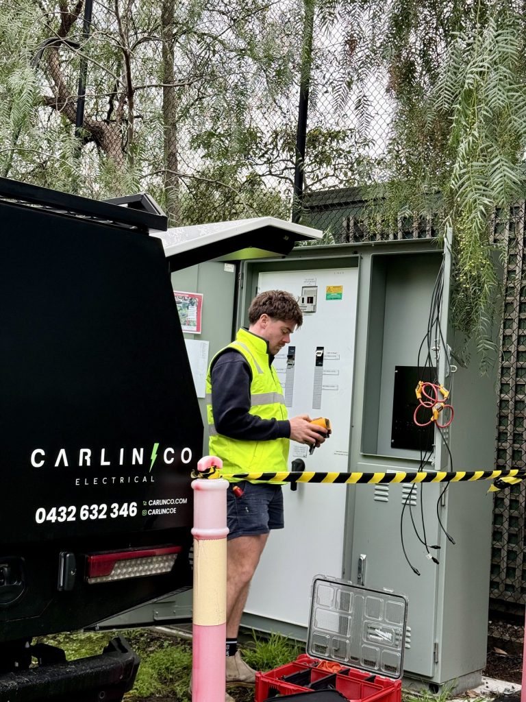 Qualified Melbourne electrician performing safety inspection