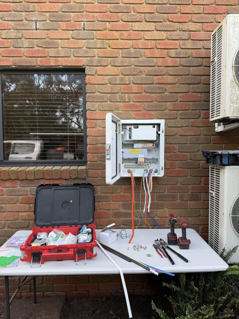 New switchboard installation on brick wall