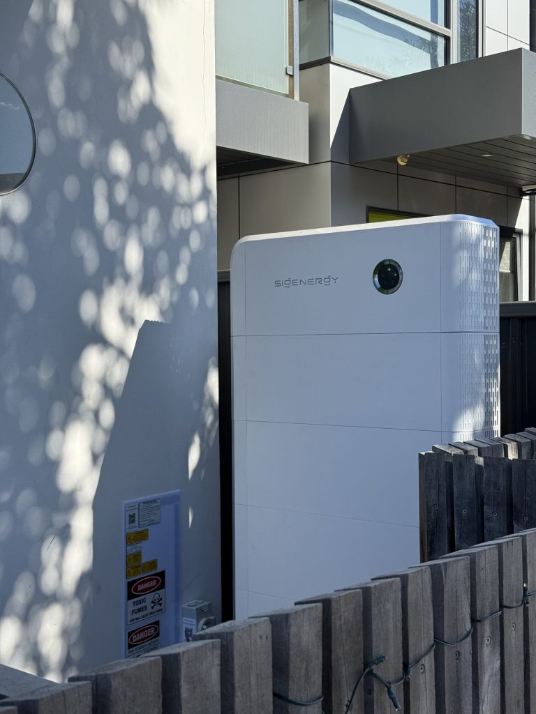 Sigenergy battery installed on modern home exterior