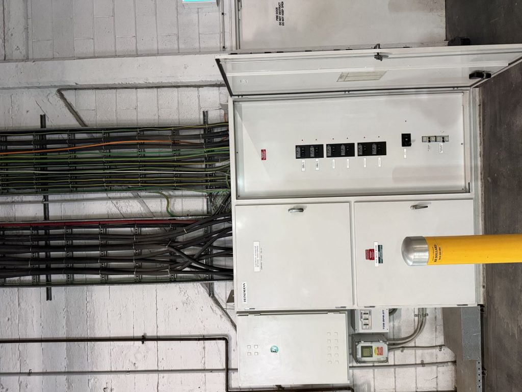 Commercial switchboard room by Carlin Co Electrical